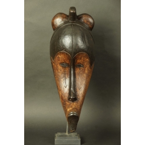 https://antyki-urbaniak.pl/4234-34560-thickbox/african-mask-with-an-elonged-shape-19th-20th-century.jpg