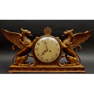 https://antyki-urbaniak.pl/4874-41165-thickbox/clock-with-bars-gilded-wood-first-half-of-the-19th-century-19th-century.jpg